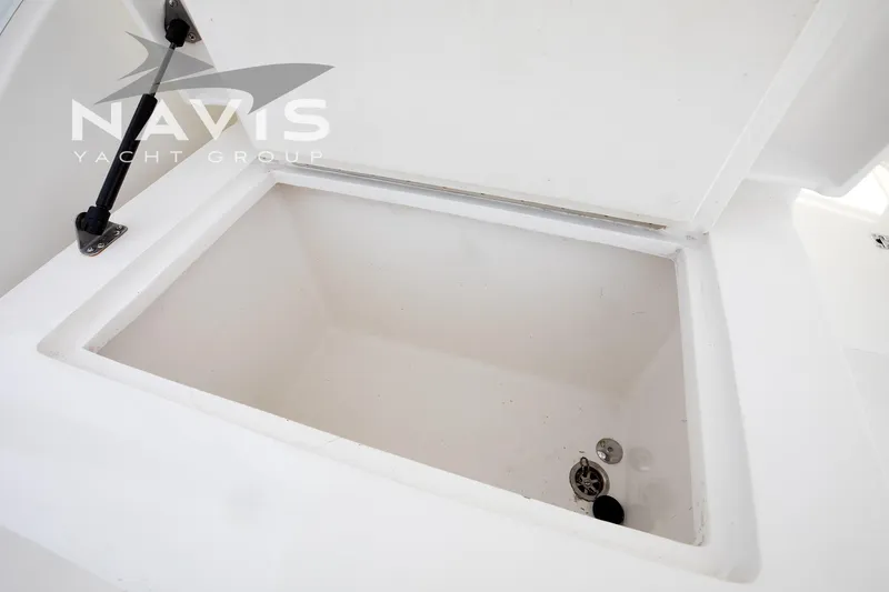 Pipe Dream Yacht Photos Pics Open storage compartment on a 2005 Topaz 32 Express yacht.