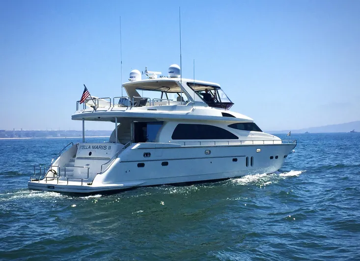 Stella Maris II Yacht Photos Pics 2007 Horizon 73 Motor Yacht cruising on open water.
