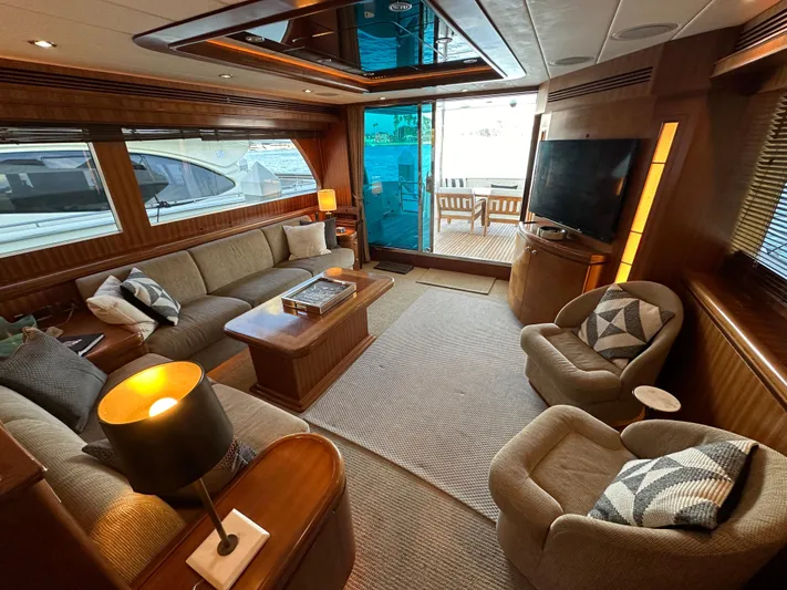 Stella Maris II Yacht Photos Pics Luxurious interior of 2007 Horizon 73 Motor Yacht with elegant seating and large windows.