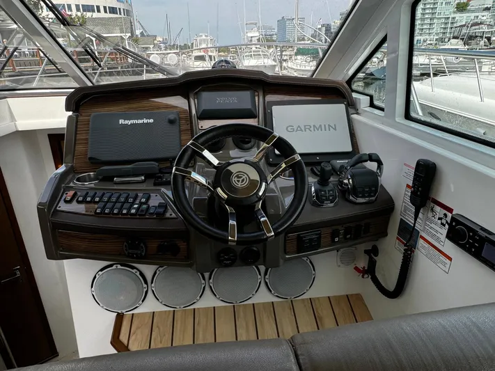  Yacht Photos Pics Helm of 2014 Cruisers Yachts 45 Cantius with Garmin and Raymarine navigation systems.