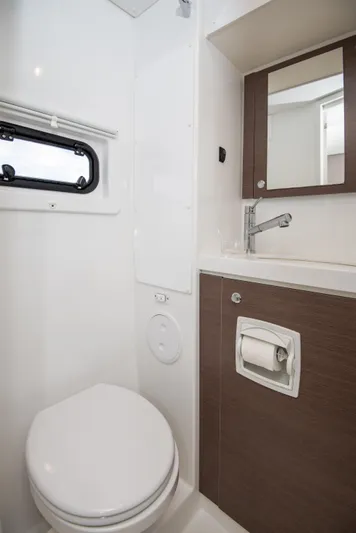 Bella Yacht Photos Pics Modern bathroom in 2021 Bali 4.8 yacht with toilet, sink, and mirror.