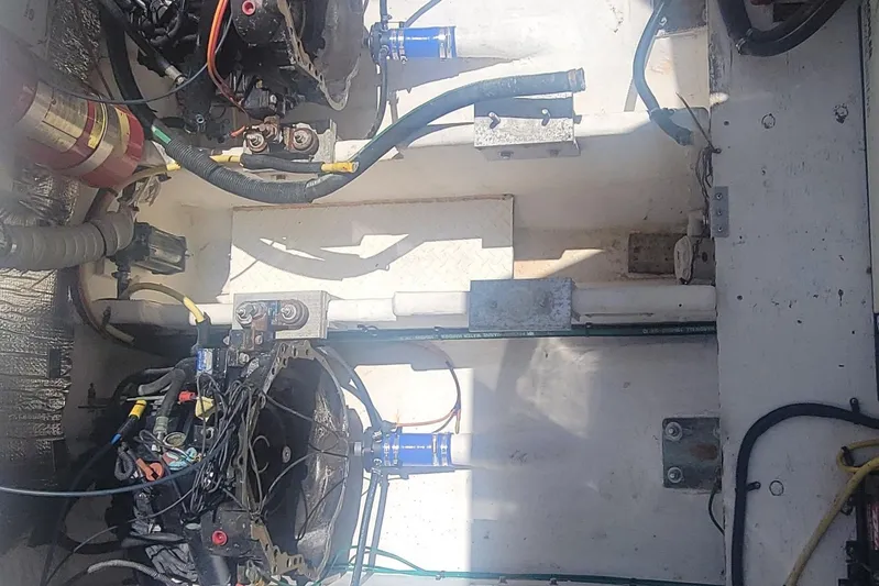 Grand Cru Yacht Photos Pics Engine compartment of a 2005 Cruisers Yachts 340 Express, showing wiring and components.