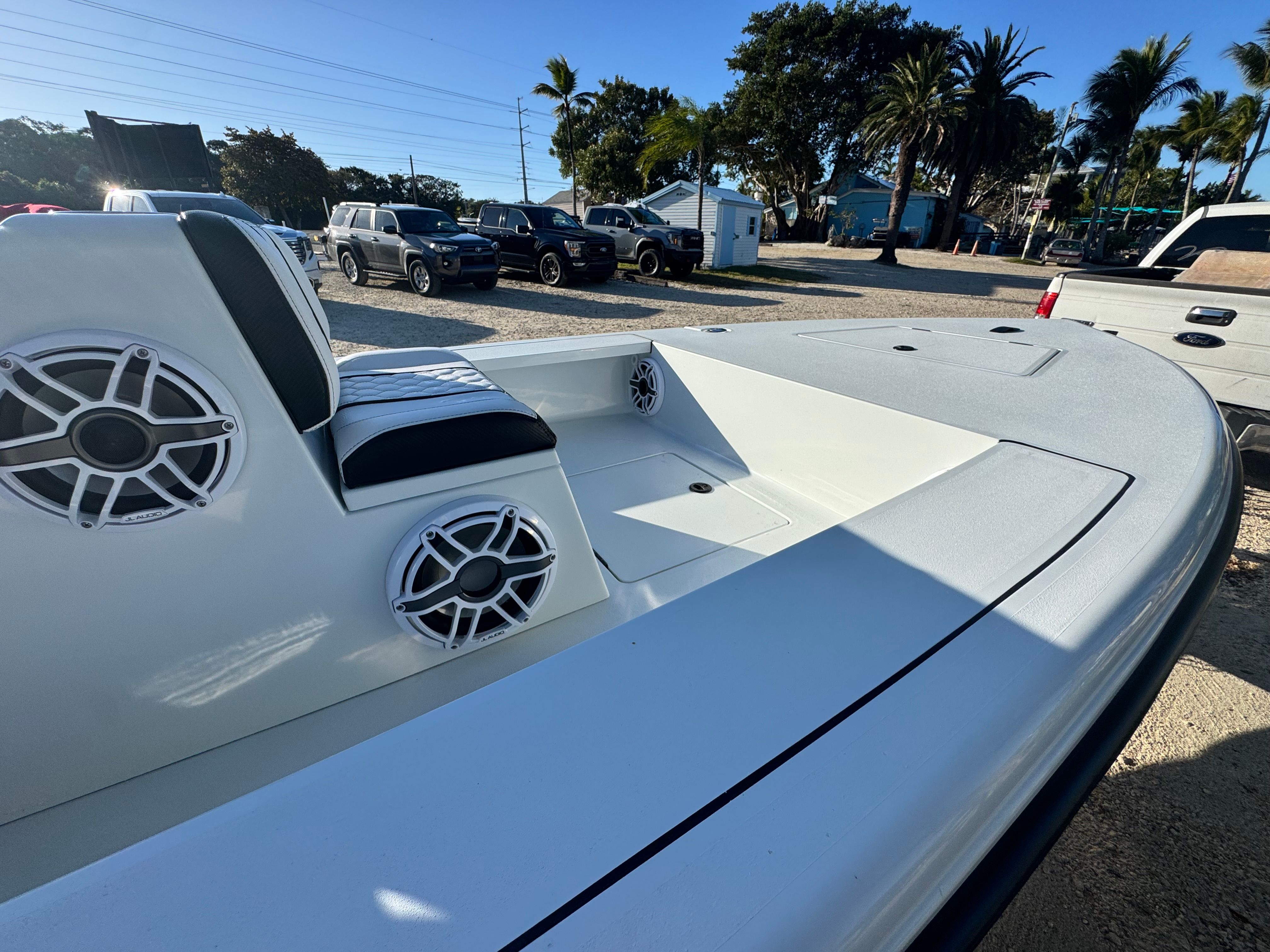 Vtech 18 FLATS boat 2026 with speakers and seating.