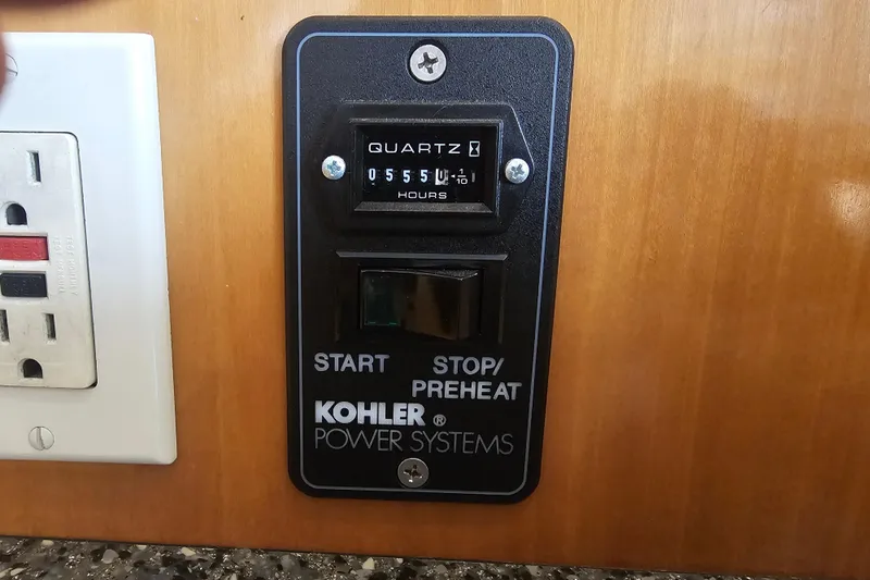 Paradox Yacht Photos Pics Kohler power system panel on 2000 Carver 530 Voyager Pilothouse yacht.