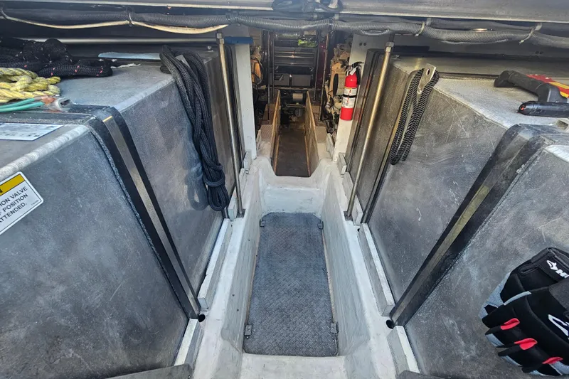 Paradox Yacht Photos Pics Engine room of 2000 Carver 530 Voyager Pilothouse with equipment and safety gear.