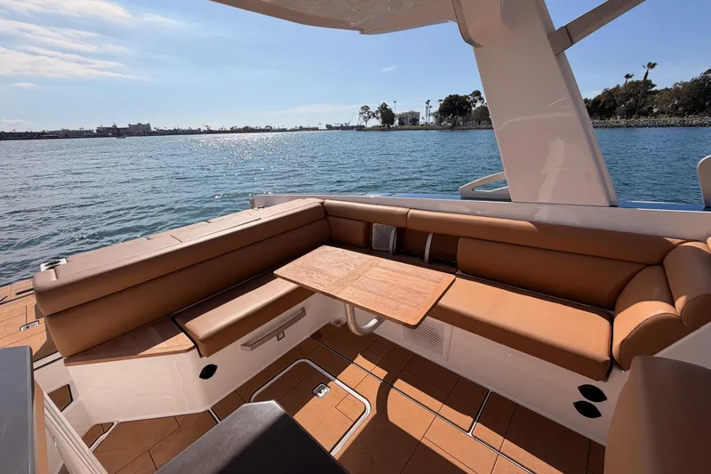 Wonder Why Yacht Photos Pics Luxurious seating area on 2022 Aviara AV32 I/O boat with scenic water view.
