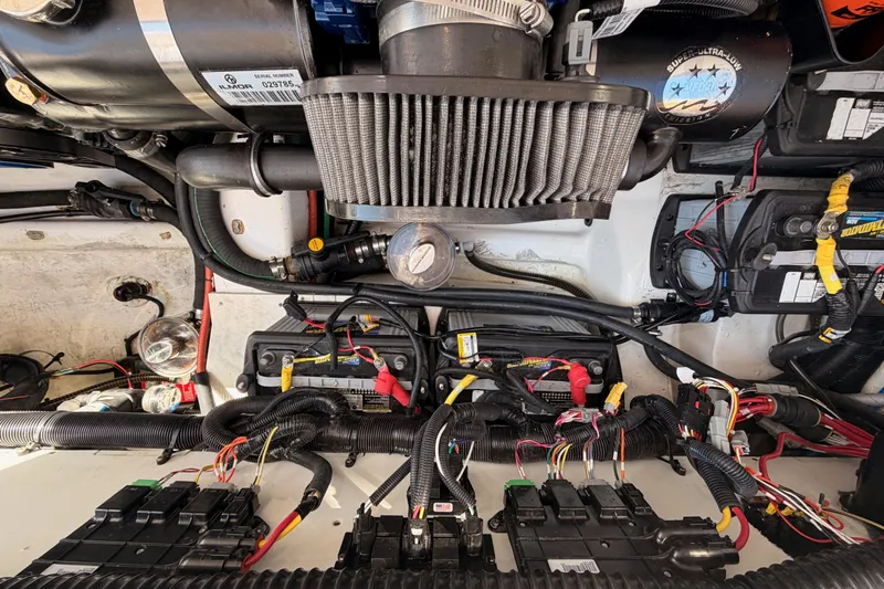Wonder Why Yacht Photos Pics Engine compartment of 2022 Aviara AV32 I/O boat, showcasing wiring and components.