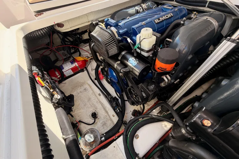 Wonder Why Yacht Photos Pics Engine compartment of 2022 Aviara AV32 I/O boat with Ilmor engine and fire extinguisher.