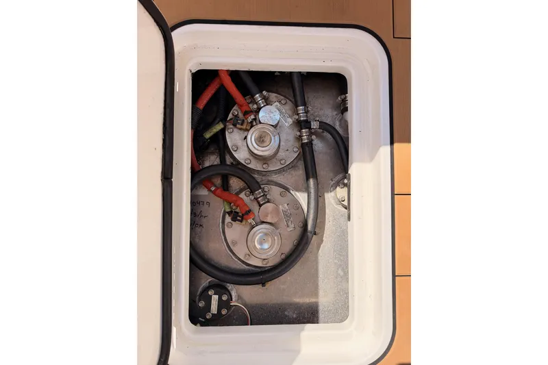 Wonder Why Yacht Photos Pics Fuel tank compartment of 2022 Aviara AV32 I/O boat with visible hoses and fittings.