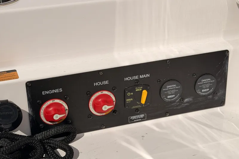 Wonder Why Yacht Photos Pics Control panel of a 2022 Aviara AV32 I/O boat with engine and house switches.