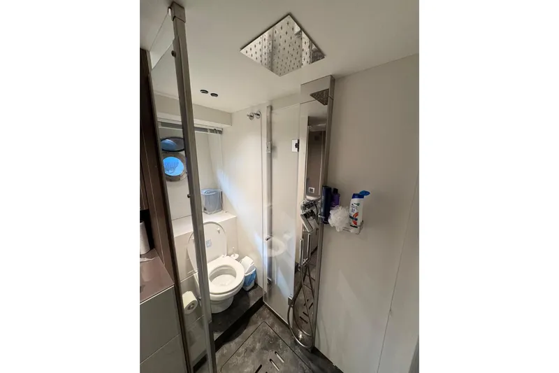  Yacht Photos Pics Modern bathroom in 2022 Cranchi T55 Trawler yacht with shower and toilet.