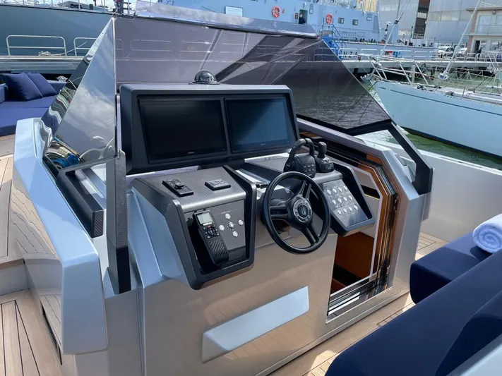  Yacht Photos Pics Helm of 2019 Wally WALLY TENDER 48 yacht with modern controls and dual screens.