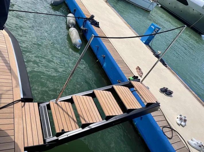  Yacht Photos Pics Stairway on 2019 Wally Tender 48 yacht docked at marina.