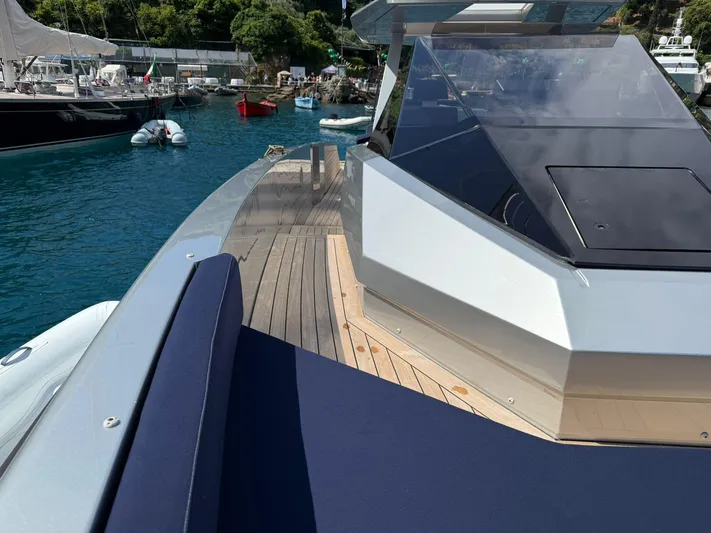  Yacht Photos Pics 2019 Wally Tender 48 yacht with sleek design, docked in a serene marina.