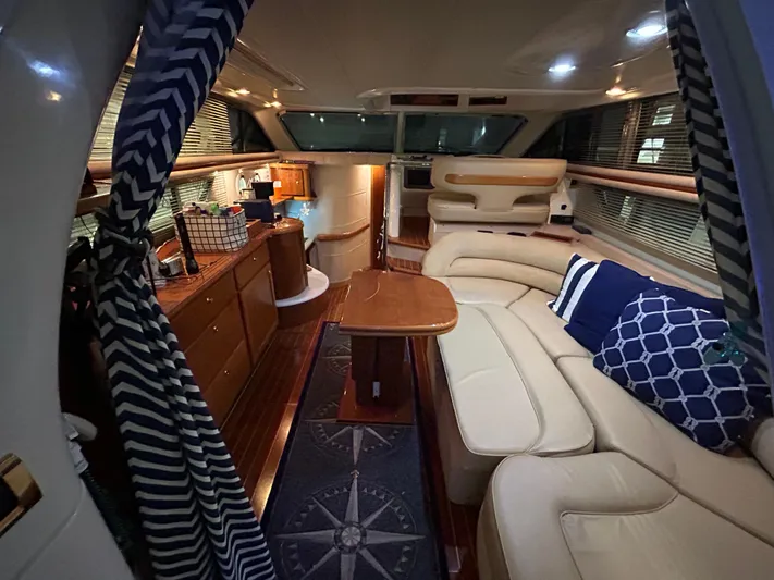  Yacht Photos Pics Luxurious interior of a 2000 Sealine F44 yacht with elegant seating and nautical decor.