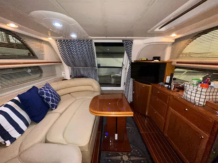  Yacht Photos Pics Luxurious interior of 2000 Sealine F44 yacht with cozy seating and modern amenities.