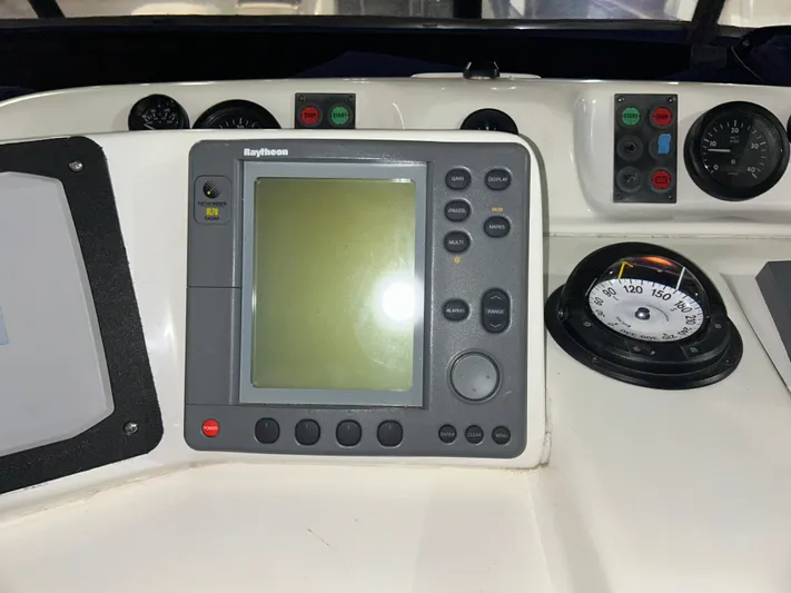  Yacht Photos Pics Control panel of a 2000 Sealine F44 boat with navigation equipment.