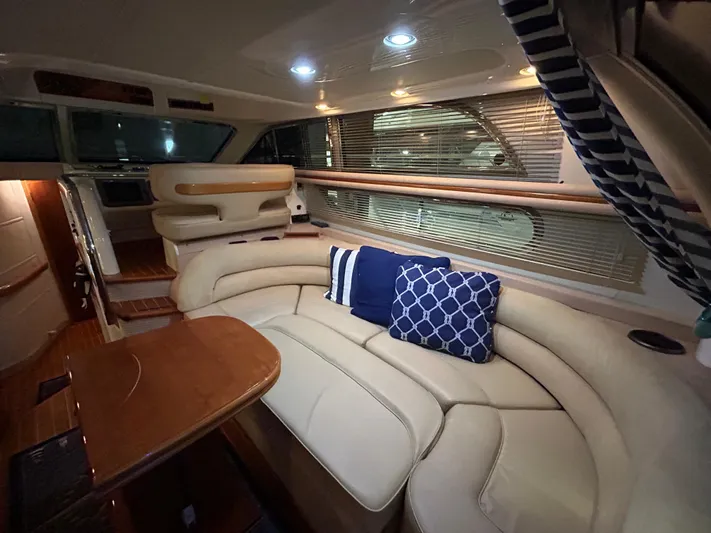  Yacht Photos Pics Luxurious interior of a 2000 Sealine F44 yacht with elegant seating and cushions.