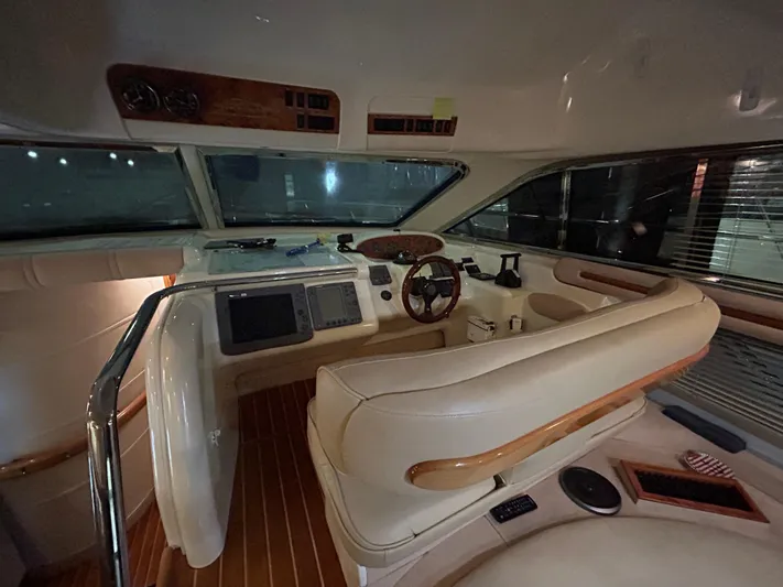  Yacht Photos Pics Interior of 2000 Sealine F44 yacht with modern helm and navigation equipment.