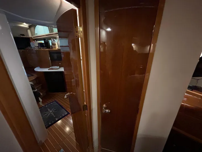  Yacht Photos Pics Interior of 2000 Sealine F44 yacht with polished wood finish and modern amenities.