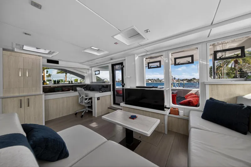  Yacht Photos Pics Luxurious interior of 2019 Leopard 58 yacht with modern furnishings and ocean view.