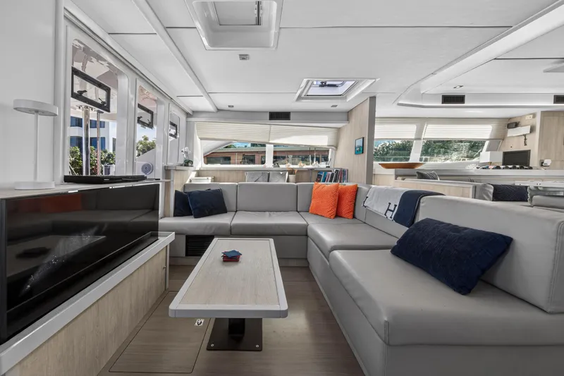  Yacht Photos Pics Luxurious interior of 2019 Leopard 58 yacht with modern seating and decor.