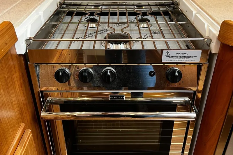 395 Yacht Photos Pics Modern Tartan 395 stove and oven, 2025 model, with sleek design and control knobs.