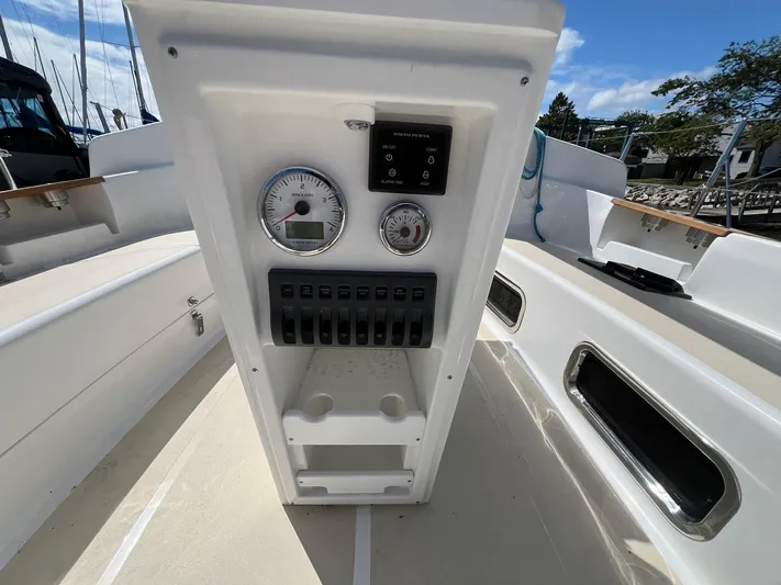 395 Yacht Photos Pics 2025 Tartan 395 sailboat cockpit with control panel and gauges.