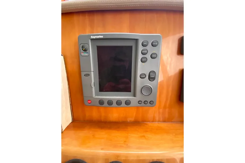It's About Time Yacht Photos Pics Raymarine navigation system on 2001 Californian 39 yacht dashboard.