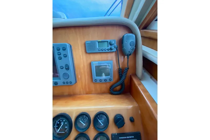 It's About Time Yacht Photos Pics Control panel of a 2001 Californian 39 boat with navigation instruments and radio.
