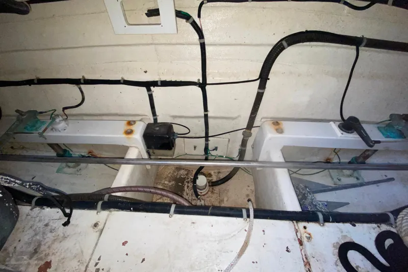 It's About Time Yacht Photos Pics 2001 Californian 39 boat engine compartment with visible wiring and components.