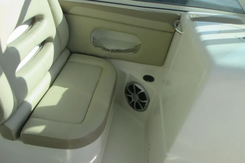  Yacht Photos Pics 2019 Sailfish 325 DC boat interior with cushioned seating and speaker.