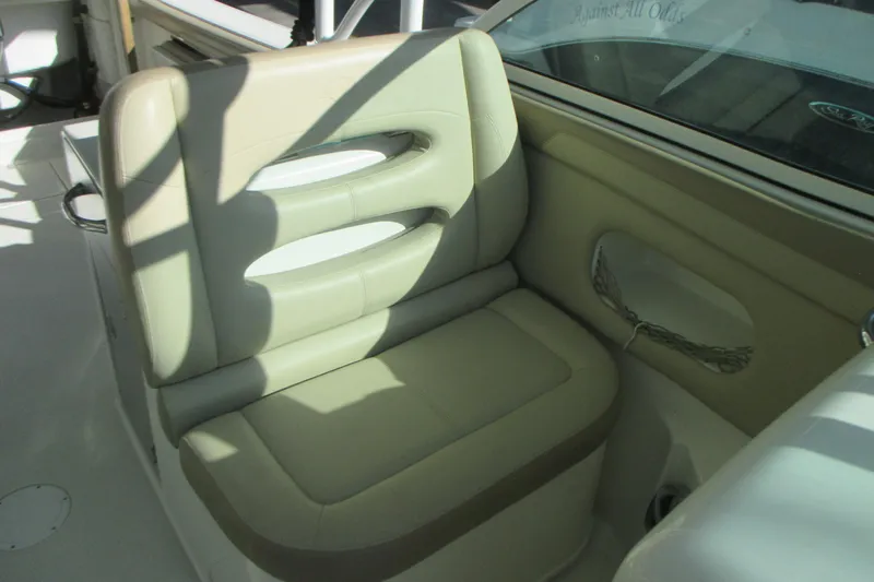  Yacht Photos Pics 2019 Sailfish 325 DC boat seat with beige upholstery and modern design.