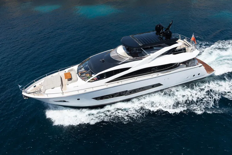 Seawater Yacht Photos Pics 2019 Sunseeker 86 Yacht cruising on open water, showcasing sleek design and luxury.