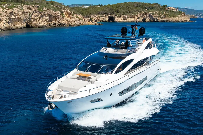 Seawater Yacht Photos Pics 2019 Sunseeker 86 Yacht cruising in clear blue waters.