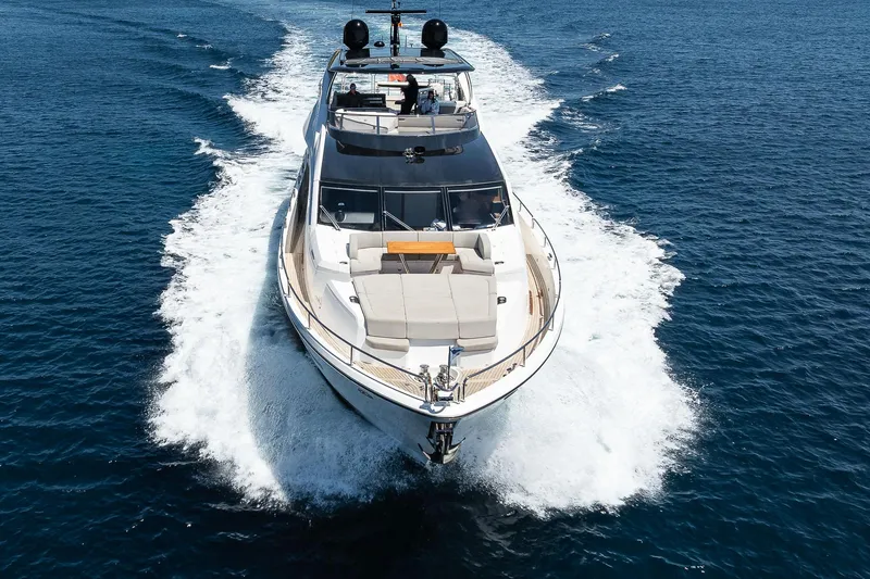 Seawater Yacht Photos Pics 2019 Sunseeker 86 Yacht cruising on open water, showcasing luxury and performance.