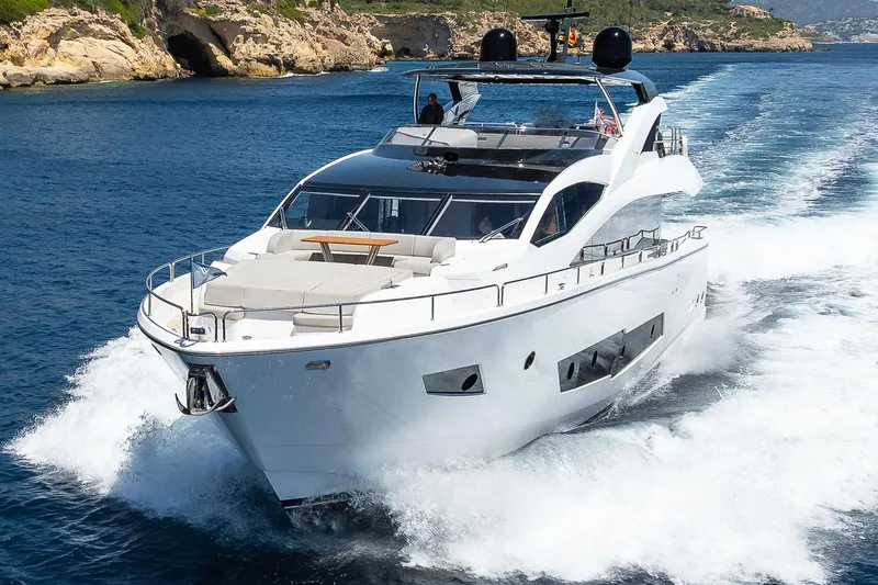 Seawater Yacht Photos Pics 2019 Sunseeker 86 Yacht cruising on open water, showcasing luxury and performance.