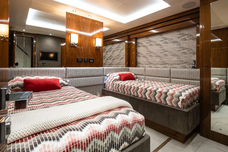 Seawater Yacht Photos Pics Luxurious 2019 Sunseeker 86 Yacht bedroom with twin beds and elegant decor.