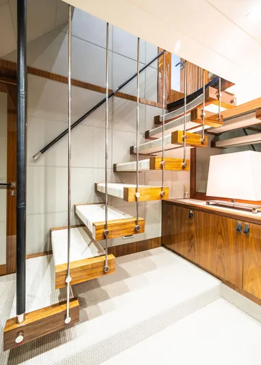 Seawater Yacht Photos Pics Modern staircase on 2019 Sunseeker 86 Yacht with wooden steps and sleek design.
