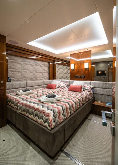 Seawater Yacht Photos Pics Luxurious bedroom interior of 2019 Sunseeker 86 Yacht with modern decor and ambient lighting.