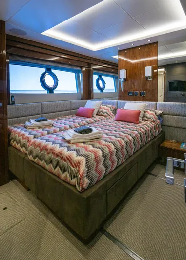 Seawater Yacht Photos Pics Luxurious bedroom interior of 2019 Sunseeker 86 Yacht with modern design and cozy bedding.