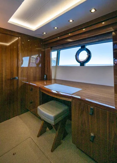 Seawater Yacht Photos Pics Luxurious interior of 2019 Sunseeker 86 Yacht with elegant wood finish and modern lighting.