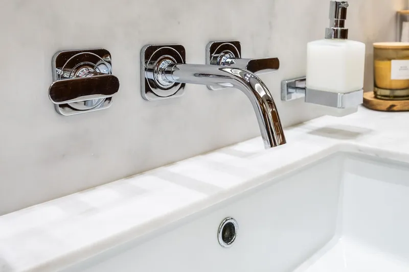 Seawater Yacht Photos Pics Luxury bathroom sink with modern chrome faucet on Sunseeker 86 Yacht, 2019 model.