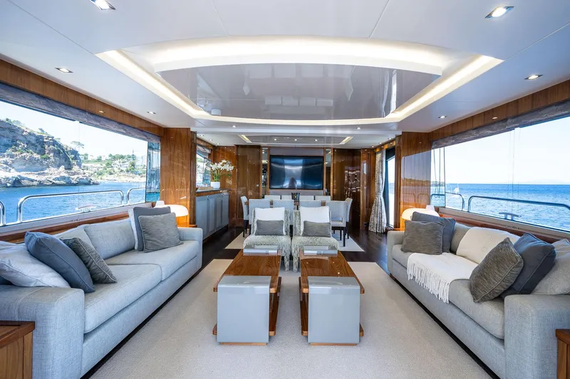 Seawater Yacht Photos Pics Luxurious interior of 2019 Sunseeker 86 Yacht with elegant seating and ocean views.