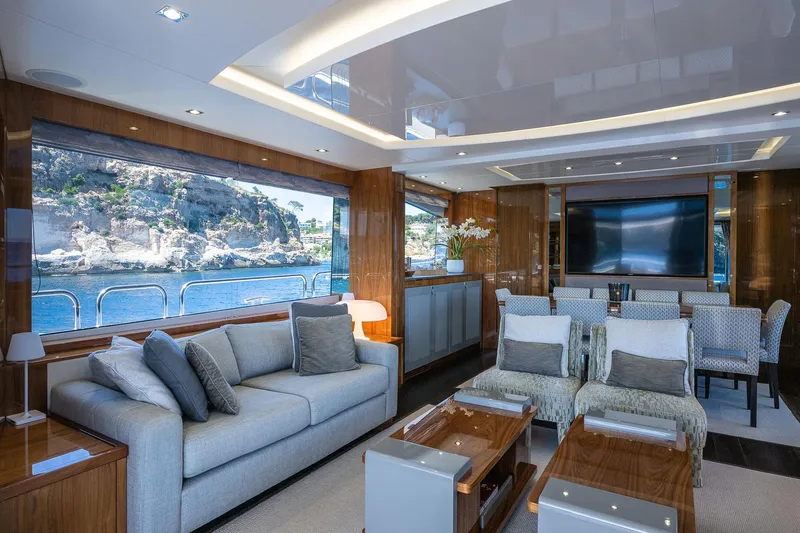 Seawater Yacht Photos Pics Luxurious interior of 2019 Sunseeker 86 Yacht with elegant seating and ocean view.