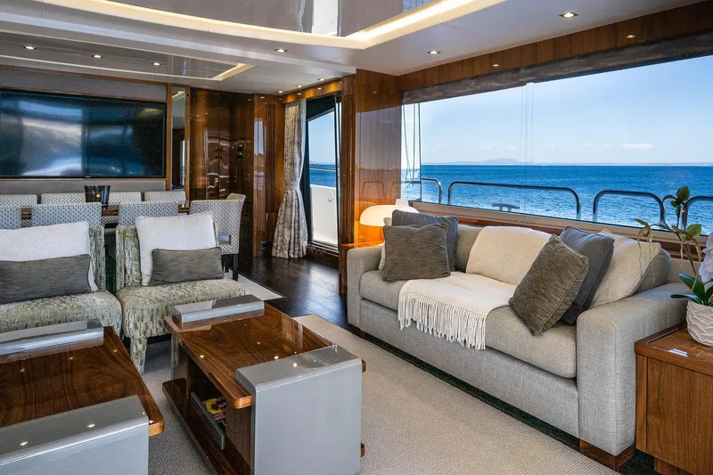 Seawater Yacht Photos Pics Luxurious interior of 2019 Sunseeker 86 Yacht with ocean view and elegant furnishings.