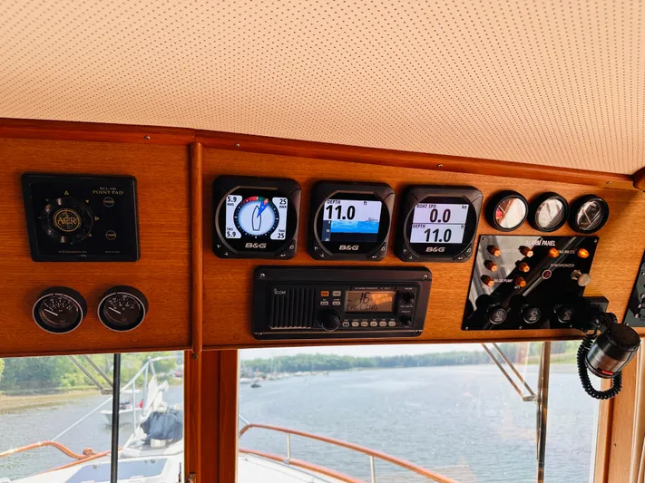 Sora Yacht Photos Pics Control panel of a 1998 Grand Banks 49 Classic yacht with navigation instruments.