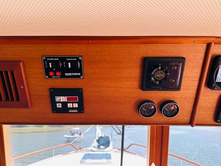 Sora Yacht Photos Pics Control panel of a 1998 Grand Banks 49 Classic yacht with navigation instruments.