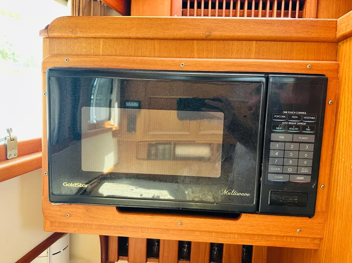 Sora Yacht Photos Pics GoldStar microwave in 1998 Grand Banks 49 Classic yacht kitchen.