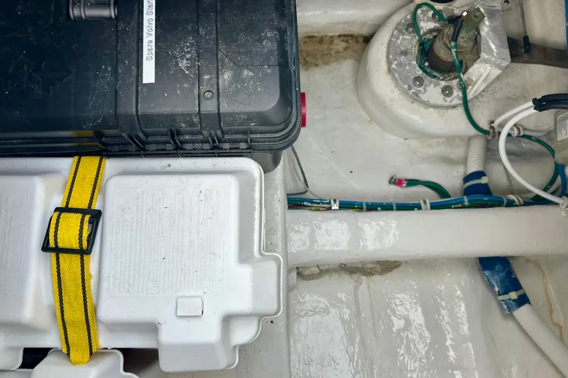  Yacht Photos Pics Engine compartment of a 2005 Bertram 390 Convertible boat, showing battery and wiring.